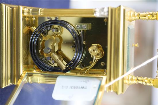 An early 20th century French gilt brass quarter-repeating carriage clock, H.7in.